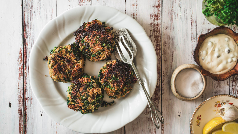 kale quinoa cakes on plate