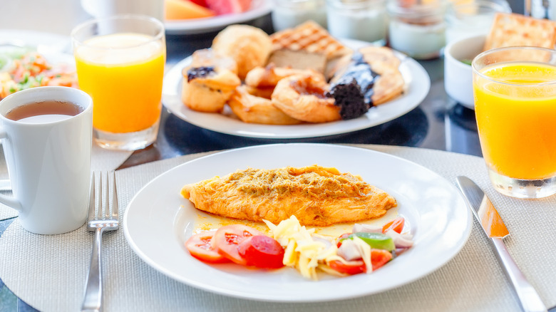 breakfast buffet omelette and orange juice