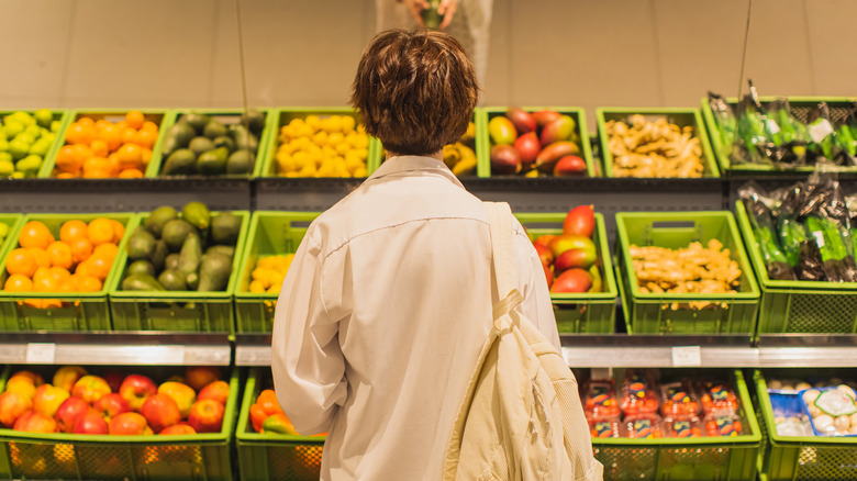 person in grocery store