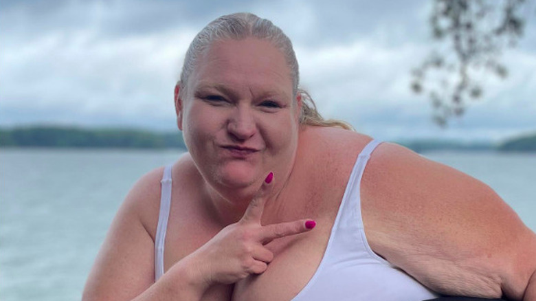 Vannessa Cross posing by lake