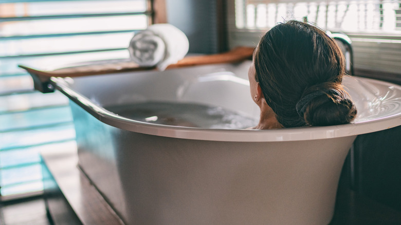 woman taking hot bath