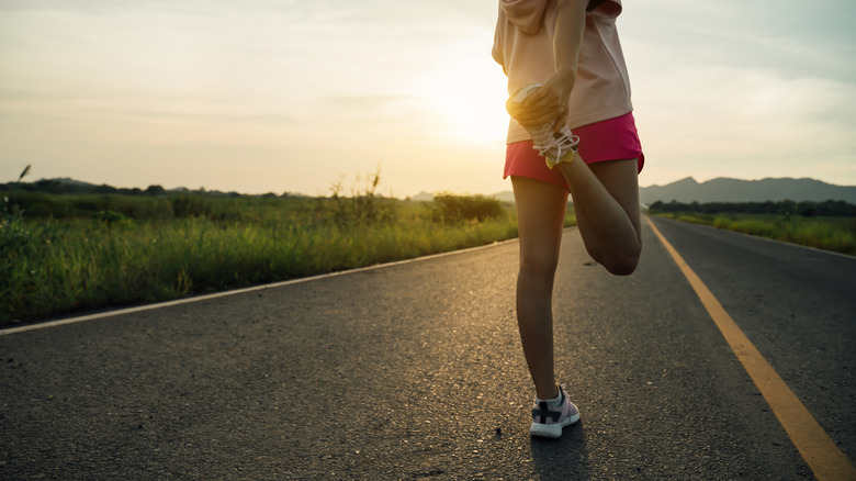 Runner stretching before a run