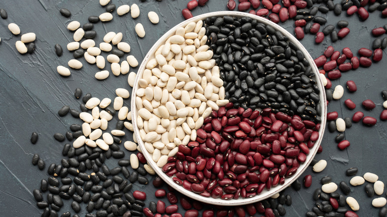 plate with dried red, white, and black beans 