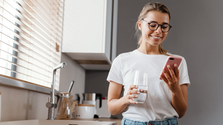 woman with glass of water