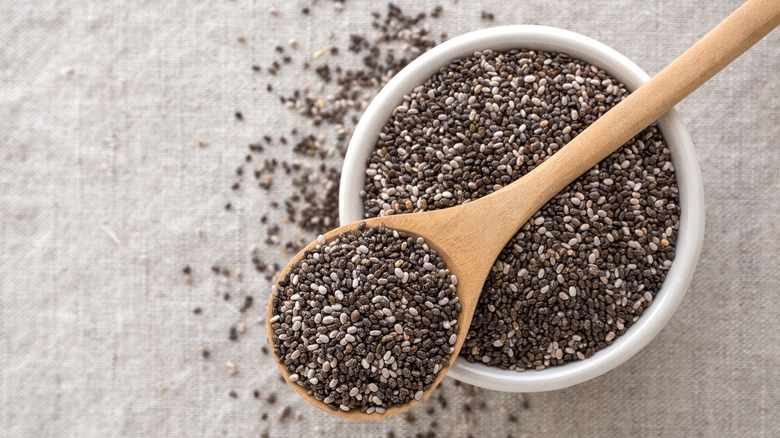 Chia Seeds in a Wooden Spoon and Bowl