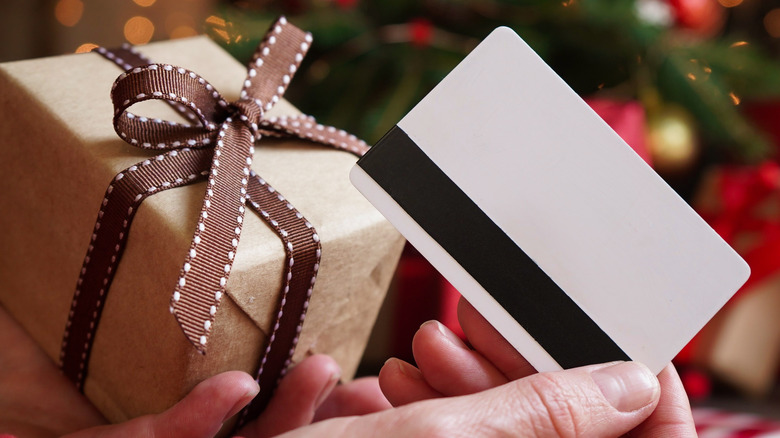 holding present and credit card