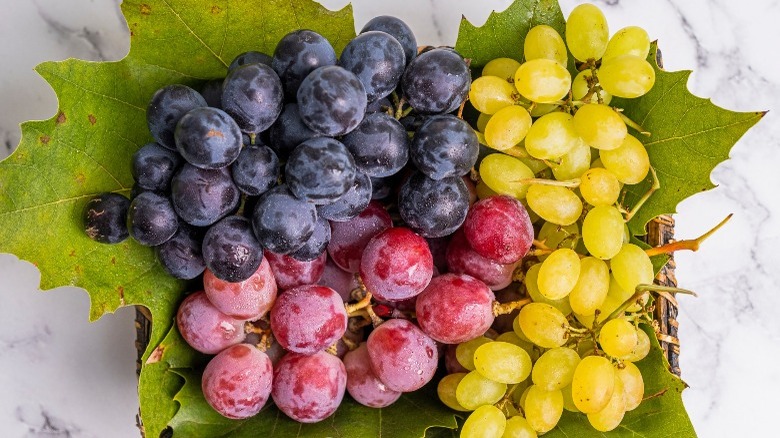 bunches of different colored grapes