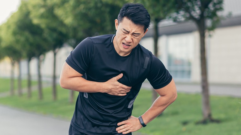 man with chest pain while exercising