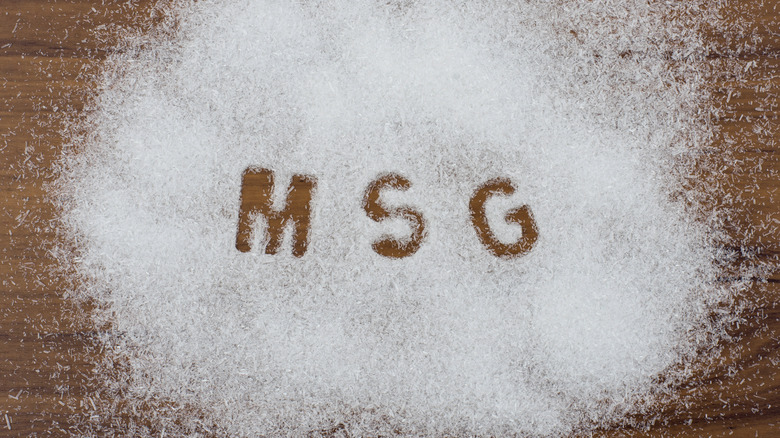 msg scattered on wooden surface