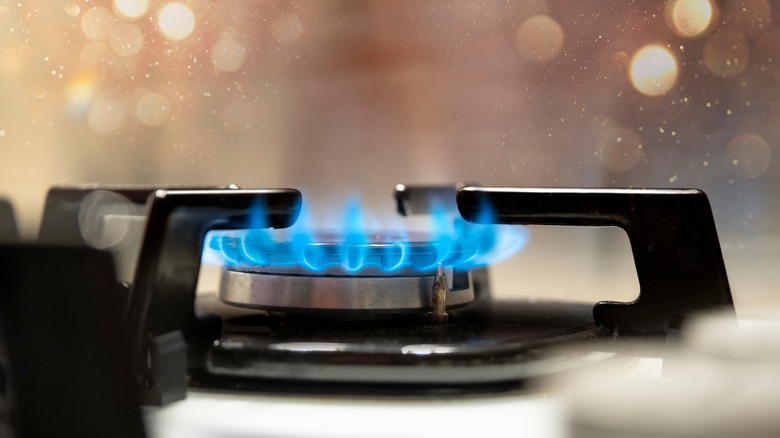 A close up of a lit gas burner