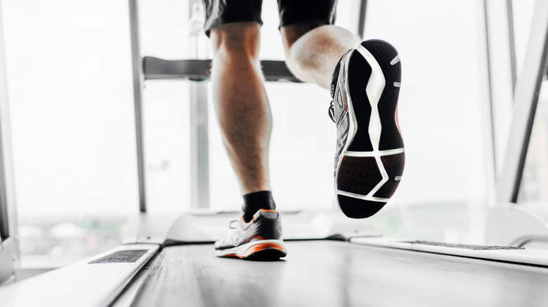 close up of feet on treadmill