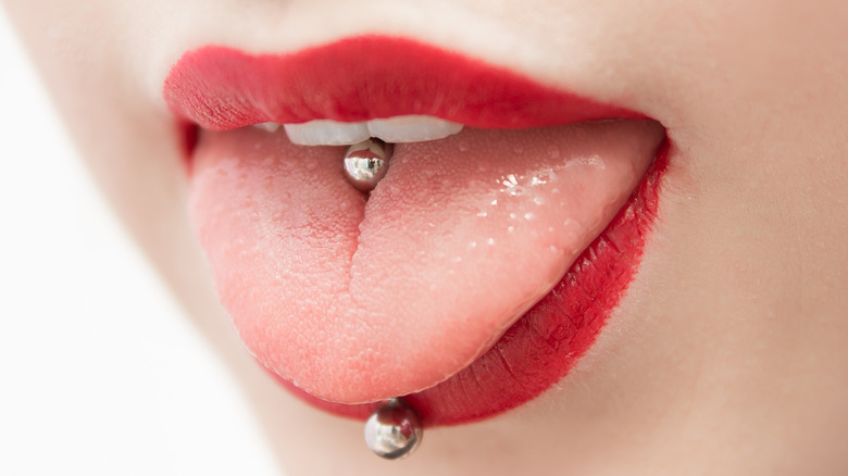 woman with tongue piercing