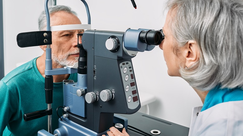 Elderly man getting his eyes checked