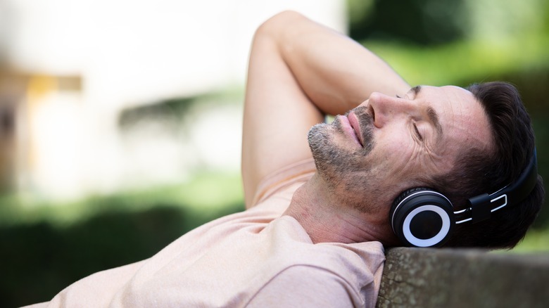 Relaxed man listening to music