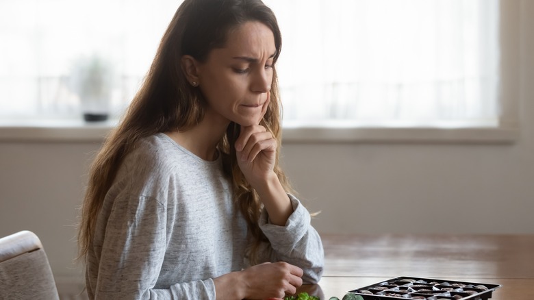 Woman looking at her plate