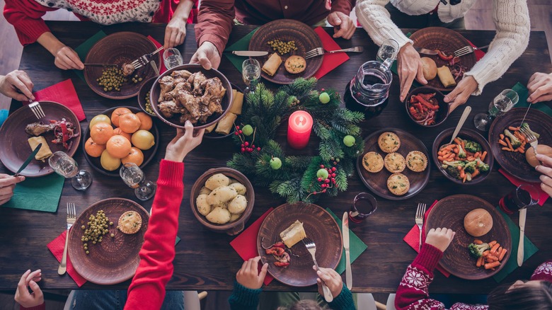 birds eye view of people enjoying christmas dinner