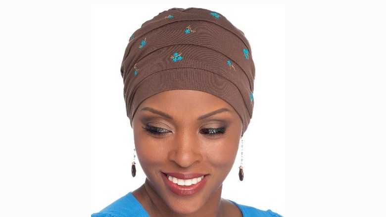 Smiling woman in beanie cap