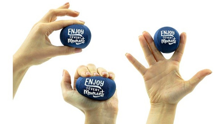 hands squeezing stress balls