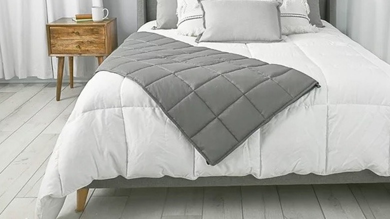 A weighted blanket on a bed