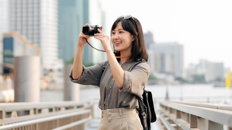 woman traveler with camera