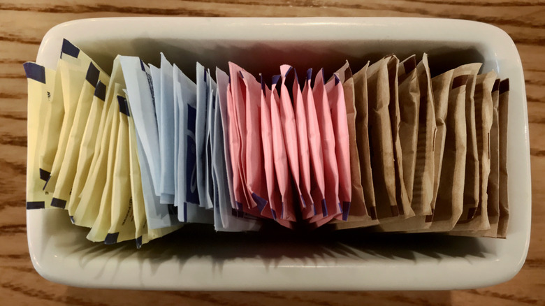 Assortment of sugars and artificial sweeteners