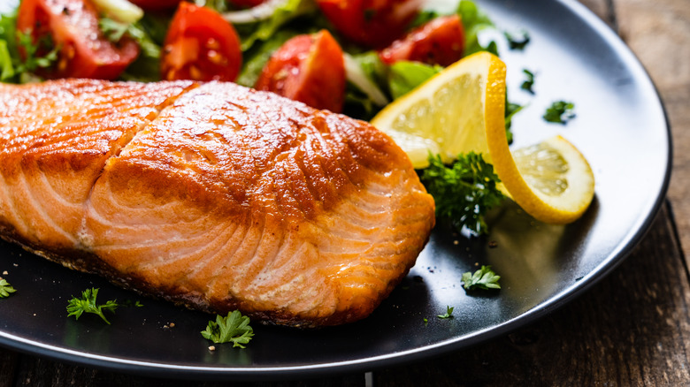 salmon served with salad