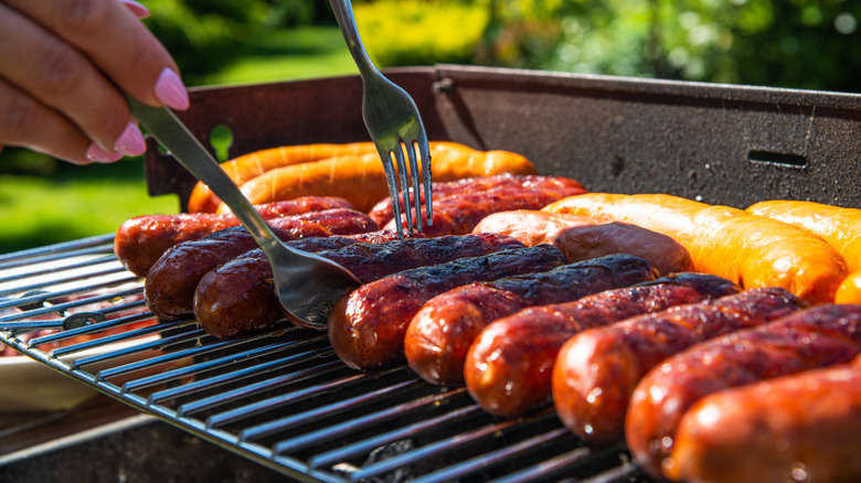 Grilling sausages