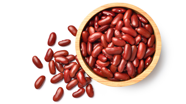 Wooden bowl filled with kidney beans 