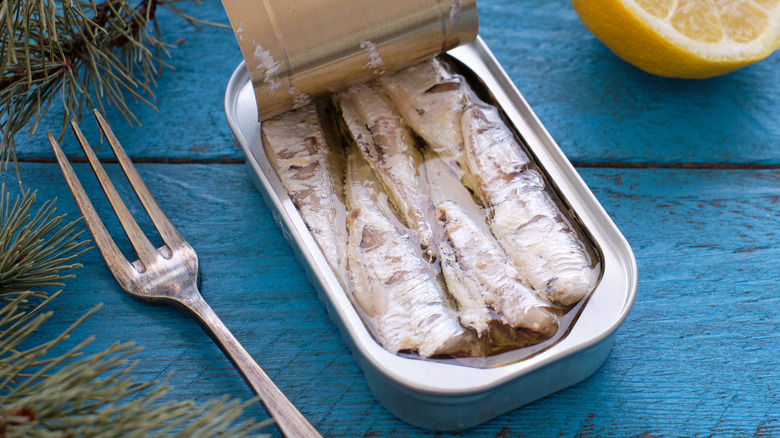 An open can of sardines 