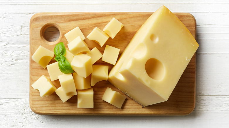 Swiss cheese on a board