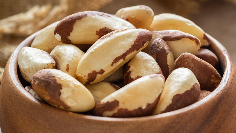 brazil nuts in a wooden bowl
