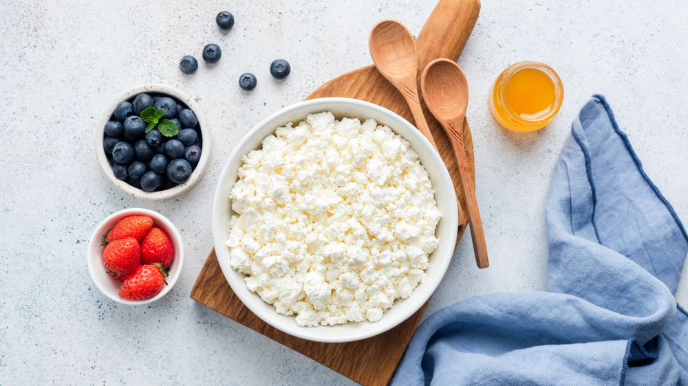 bowl of cottage cheese with honey and berries