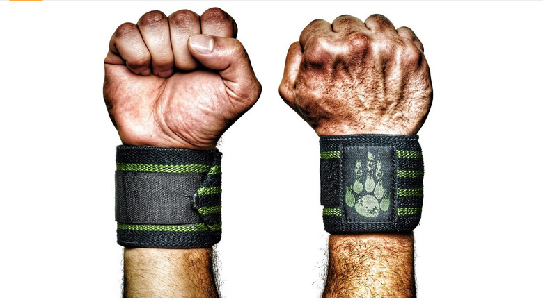 two fists with wrist wraps