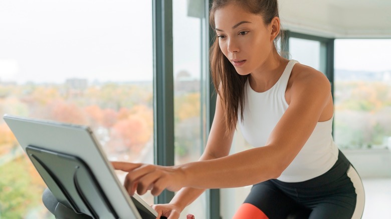 person doing an online cycling class