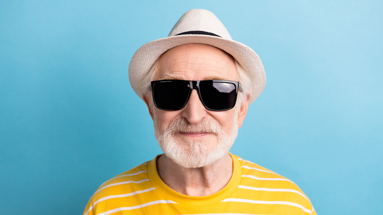 man wearing hat and sunglasses