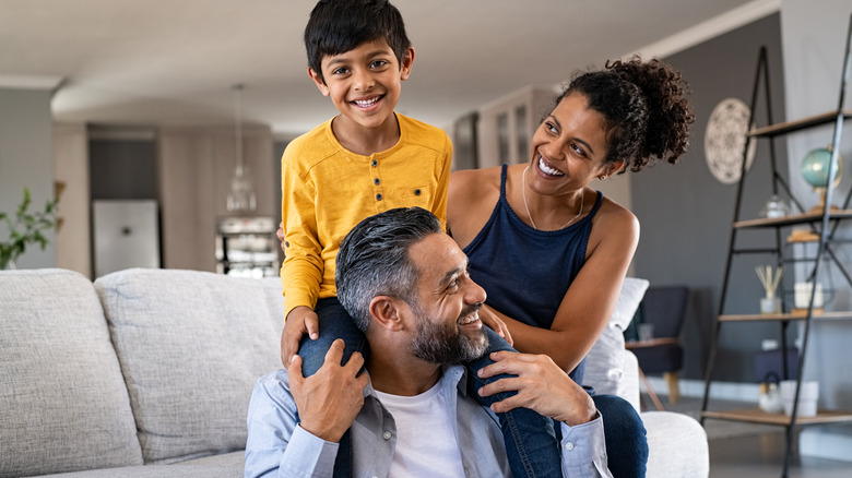 Family playing in living room