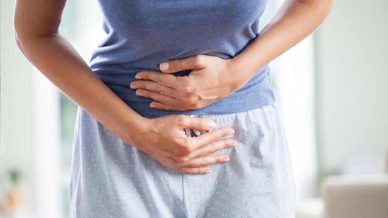 A woman has stomach bloating