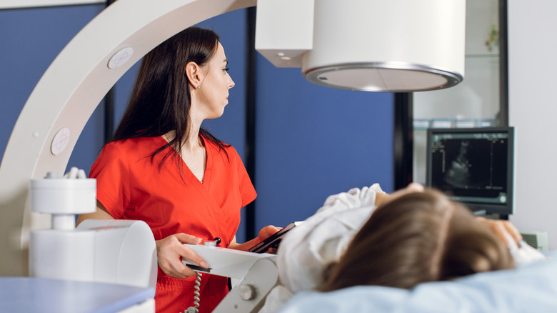 Patient receiving kidney stone scan