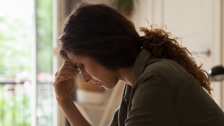 Woman looking hopeless and depressed