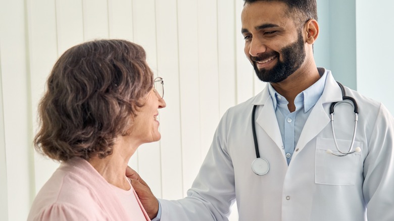 Doctor speaking to patient