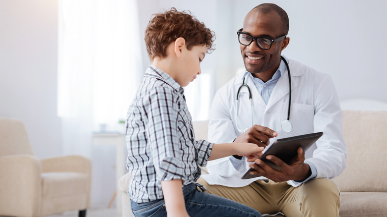 Doctor and a child patient with ADHD