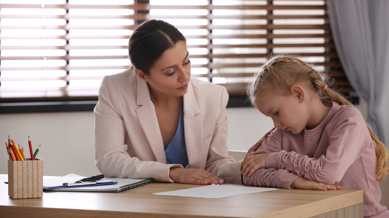 Doctor and child patient with ADHD