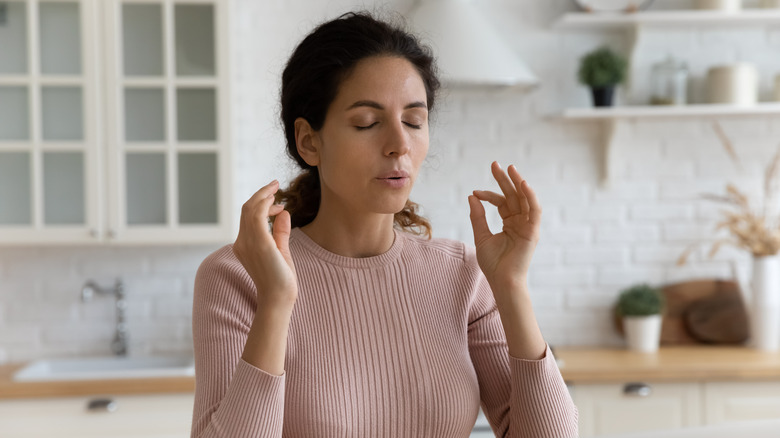 woman doing breathwork