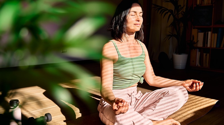 woman practicing yoga