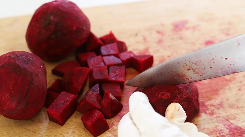 hand chopping beets