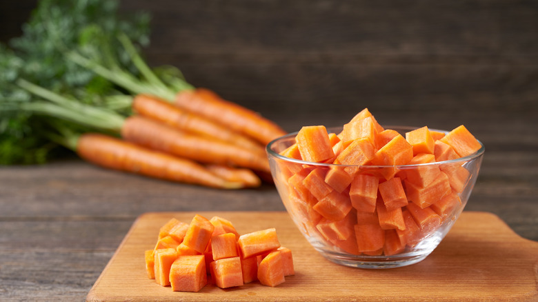 diced carrots on wooden board