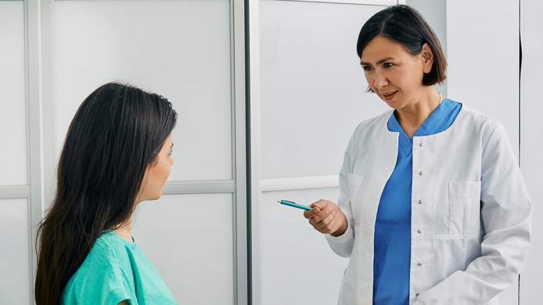 Patient talking with doctor