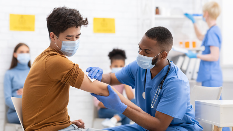 Young man getting a vaccine