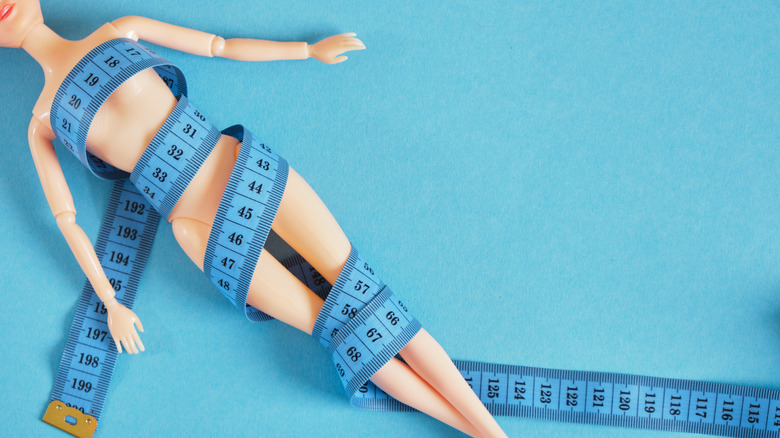doll wrapped measuring tape