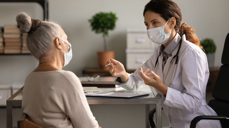 Woman speaking with her doctor